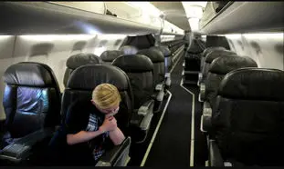 روایت غم‌انگیز عکاس رویترز از یک سفر هوایی در آمریکا