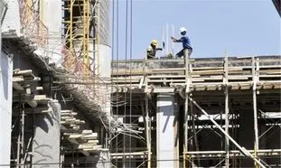 کارگران ساختمانی بیمه می‌شوند