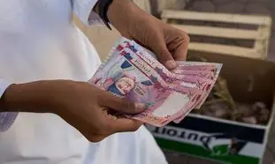بررسی عوامل موثر بر نرخ تبدیل حواله ریال عمان