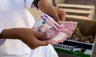 بررسی عوامل موثر بر نرخ تبدیل حواله ریال عمان