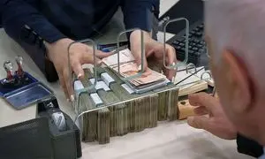 نحوه دریافت وام بدون ضامن 100 میلیون تومانی بانک ملت + مبلغ اقساط